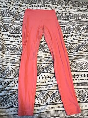 Lululemon Coral Leggings Missing inside tag.